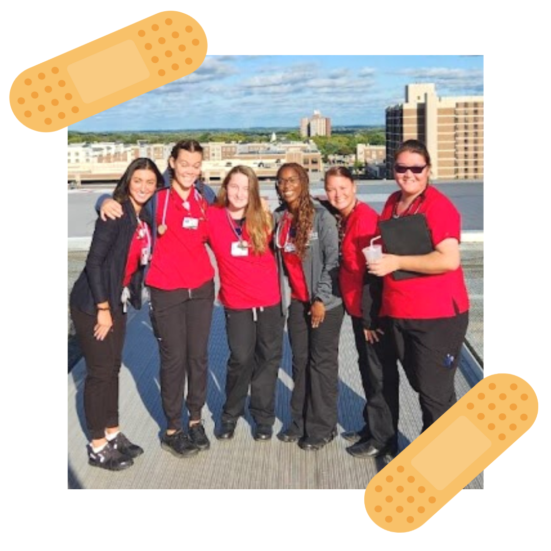  Joanna in nursing scrubs, with a group of fellow students